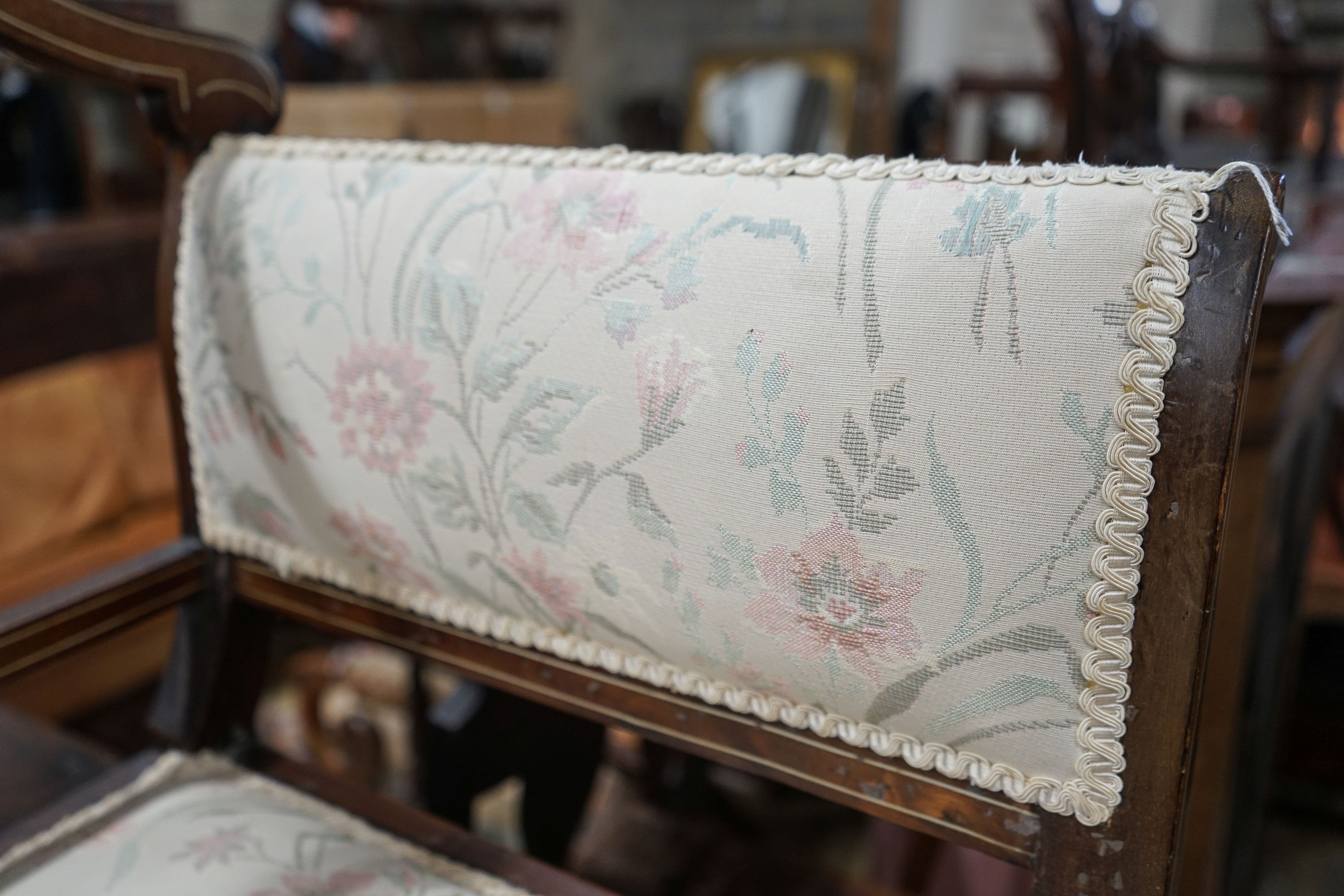 An Edwardian marquetry inlaid mahogany window seat, length 107cm, depth 44cm, height 79cm